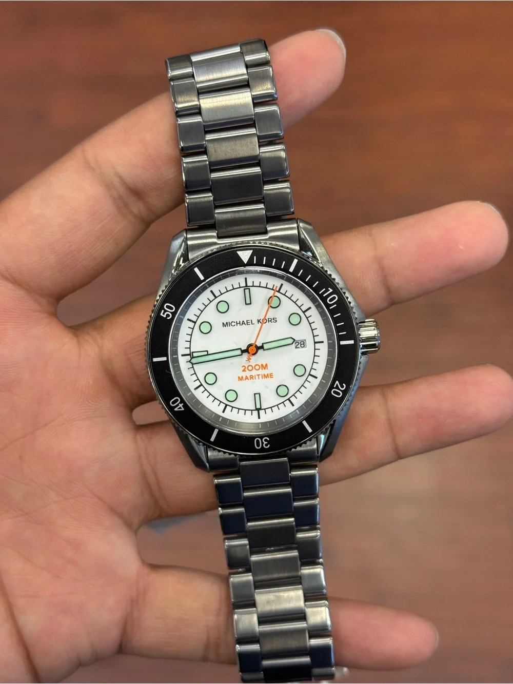 Michael Kors Silver Stainless Steel Watch with Black Bezel and White Dial men’s